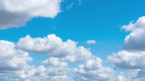 Cumulus Cirrus Clouds move in the Blue Sky. Time lapse. Stock Footage 137386474