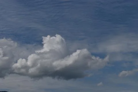 Cumulus cloud in the blue sky over Liechtenstein 3.5.2020 Stock Photos