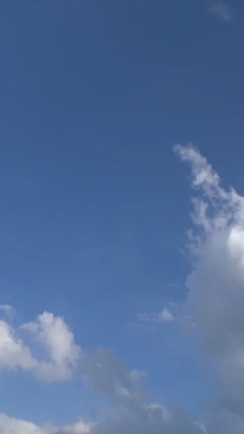 Cumulus Cloud Building Up in Clear Blue Sky Time Lapse Vertical Stock-Footage 345938181