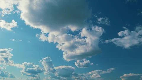 Cumulus Cloud Cloudscape Moving And Changing With Different Shapes. Puffy Fluffy Stock Photos