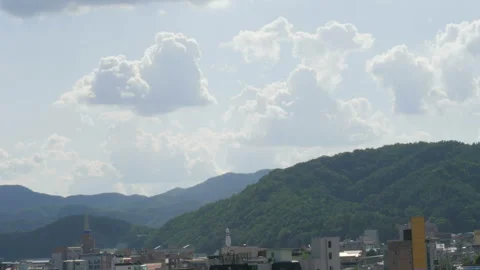 Cumulus cloud floating above the sky Stock Footage 94011947