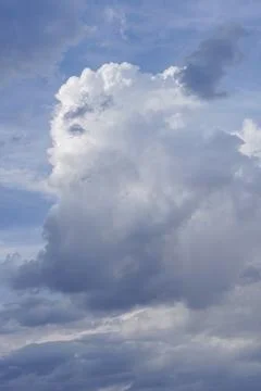 Cumulus cloud formation appearing like a human face 写真素材