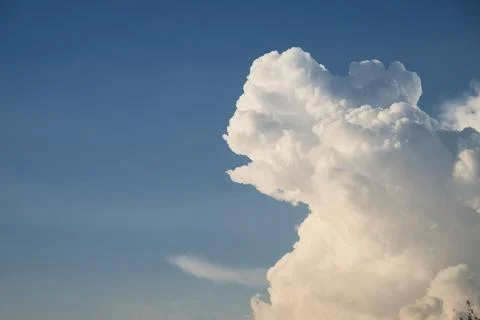 Cumulus cloud formation developing in blue sky Stock Photos
