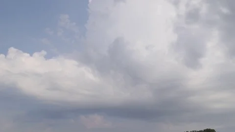 Cumulus cloud growing Stock Footage 76327013