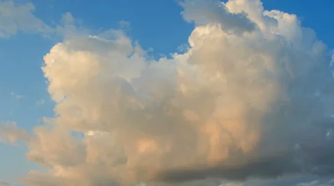 The cumulus cloud with the quickly moves against the blue sky Stock Footage 62513900