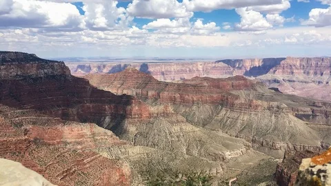 Cumulus cloud shadow creeping down Grand Canyon North Rim Stock Footage 84028742