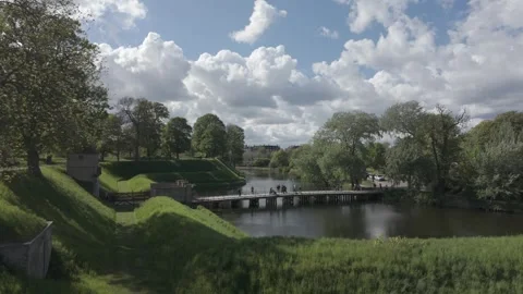 Cumulus clouds above the moat and ramparts of Kastellet Video stock 341288942