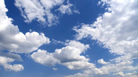 Cumulus clouds against the blue sky. Stock Footage