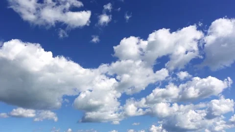 Cumulus clouds against a blue sky Stock Footage 285177183