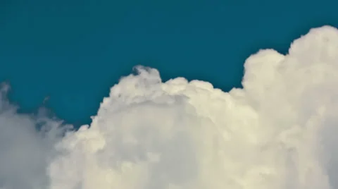 Cumulus clouds against light blue sky - 4K Ultra HD time lapse Video stock 35515954