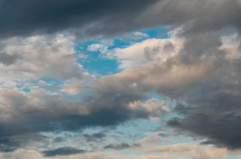 Cumulus clouds and gaps of clear blue sky. Foto stock