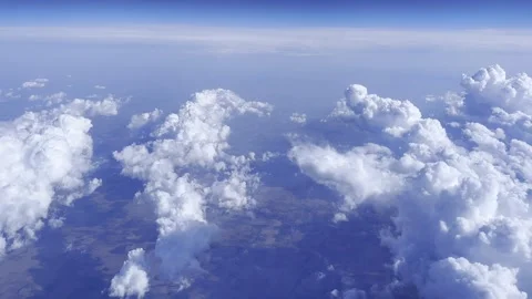 Cumulus Clouds and Suburb View From Airplane Window 動画素材 335396910