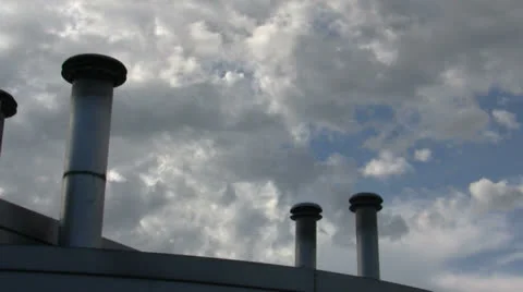 CUMULUS CLOUDS WITH APARTMENT BUILDING VENT STACKS TIMELAPSE Stock Footage 25593443