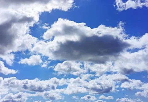 Cumulus clouds on blue sky background Foto stock
