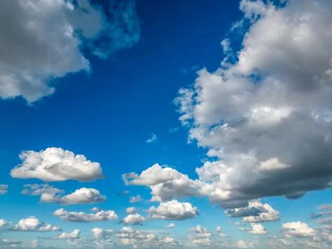 Cumulus Clouds on Blue Sky Background Stock Photos