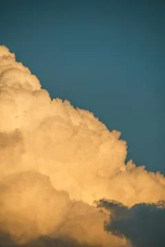 Cumulus clouds on a blue sky. Flight Stock Photos