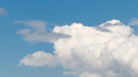 Cumulus clouds in the blue sky Stock Photos