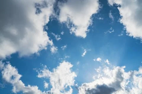 Cumulus clouds in a blue sky Foto stock
