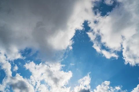 Cumulus clouds in a blue sky Stock Photos