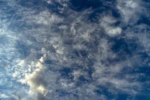 Cumulus clouds in a blue sky. Stock Photos
