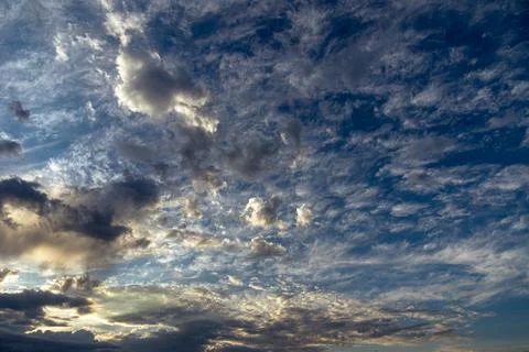Cumulus clouds in a blue sky. Stock Photos