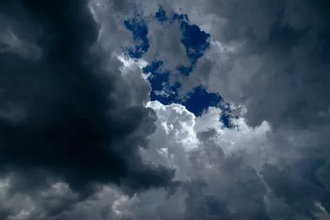 Cumulus clouds in a blue sky. Stock Photos
