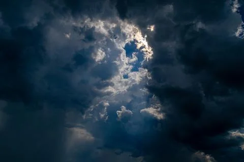 Cumulus clouds in a blue sky. Stock Photos