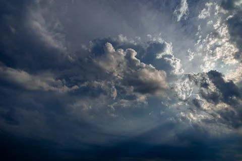 Cumulus clouds in a blue sky. Stock Photos