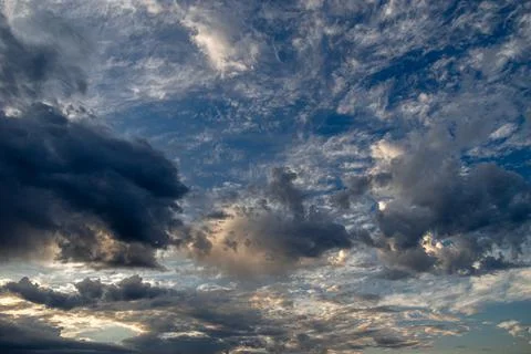 Cumulus clouds in a blue sky. Stock Photos