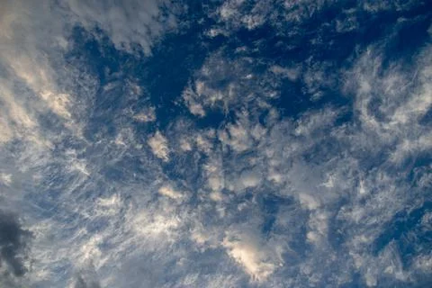 Cumulus clouds in a blue sky. Stock Photos