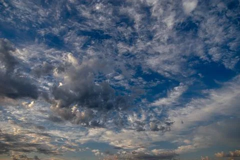 Cumulus clouds in a blue sky. Stock Photos