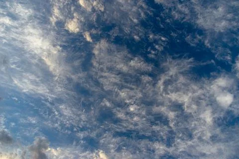 Cumulus clouds in a blue sky. Stock Photos