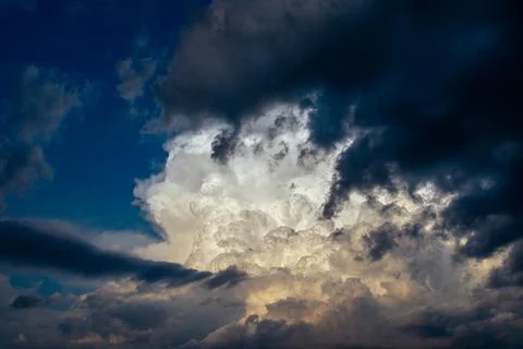 Cumulus clouds in a blue sky. Stock Photos