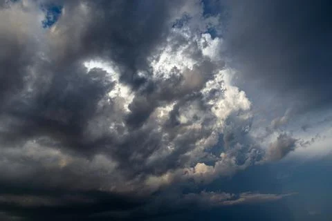 Cumulus clouds in a blue sky. Stock Photos