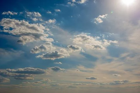 Cumulus clouds in a blue sky Stock Photos