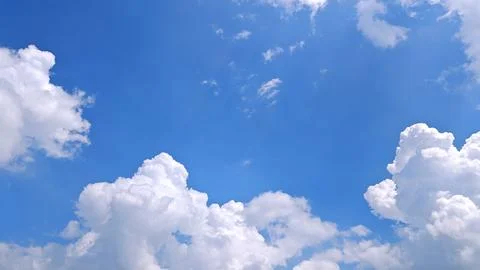 Cumulus Clouds in Clear Blue Sky 스톡 사진