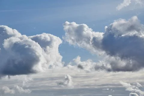 Cumulus clouds cover the sky Stock Photos