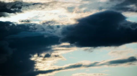 Cumulus clouds cover the sun's rays Stock Footage 48854149
