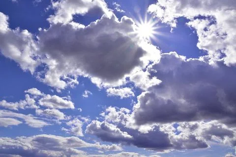 Cumulus clouds in the deep spring sky of the Western Urals Stock Photos