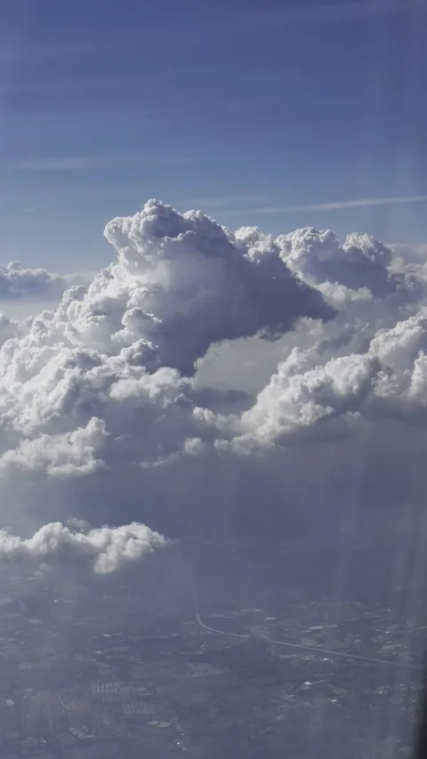 Cumulus clouds from flight altitude Stock Footage 283816559