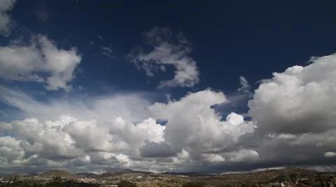 Cumulus Clouds float over Tecate, Mexico near the Mexican-US border. 스톡 동영상 63268033