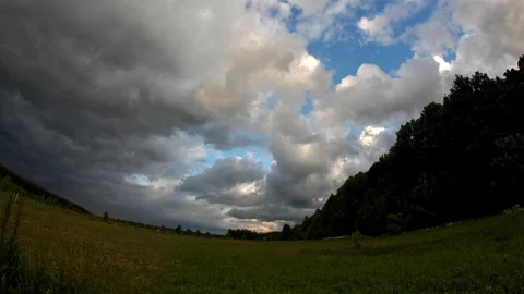 Cumulus Clouds floating in the sky on a sunny day timelapse Stock Footage 92093882