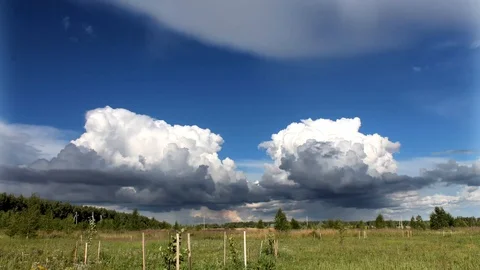 Cumulus Clouds floating in the sky on a sunny day timelapse Stock Footage 92093921