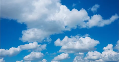 Cumulus clouds flying  against the blue sky Video stock 68949461