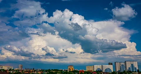 Cumulus clouds flying over the city Stock Footage 159062120