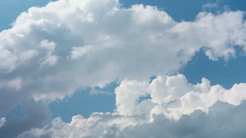Cumulus clouds forming in blue sky indicating thermal updrafts for gliding Stock Footage 340039297