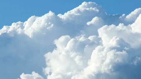 Cumulus clouds growing in the sky time lapse Stock Footage 34315209