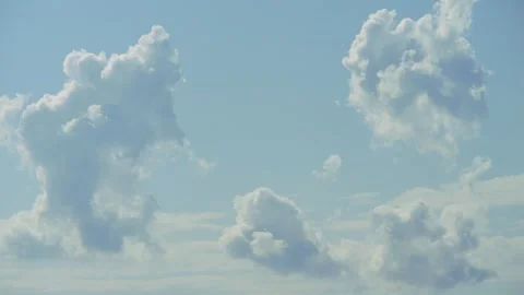 Cumulus clouds moves in the blue sky. The background of light and heavy calm Stock Footage 331885207