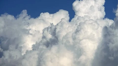 Cumulus clouds moves in the blue sky. The background of light and heavy calm Stock-Footage 331885290