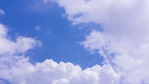 Cumulus Clouds Moving On A Blue Sky Stock-Footage 80051724